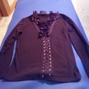 Purple knit top with ruffles